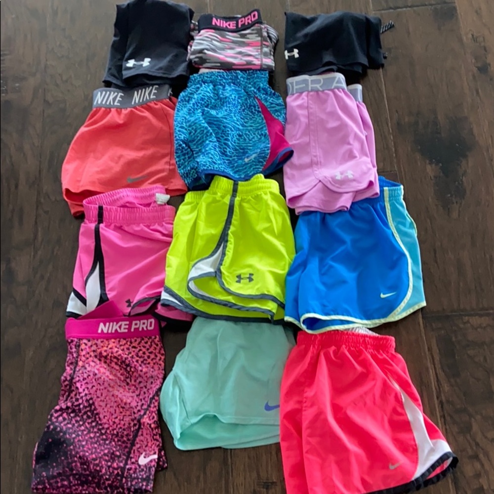 12 Athletic shorts (5 Under Armour & 7 Nike)